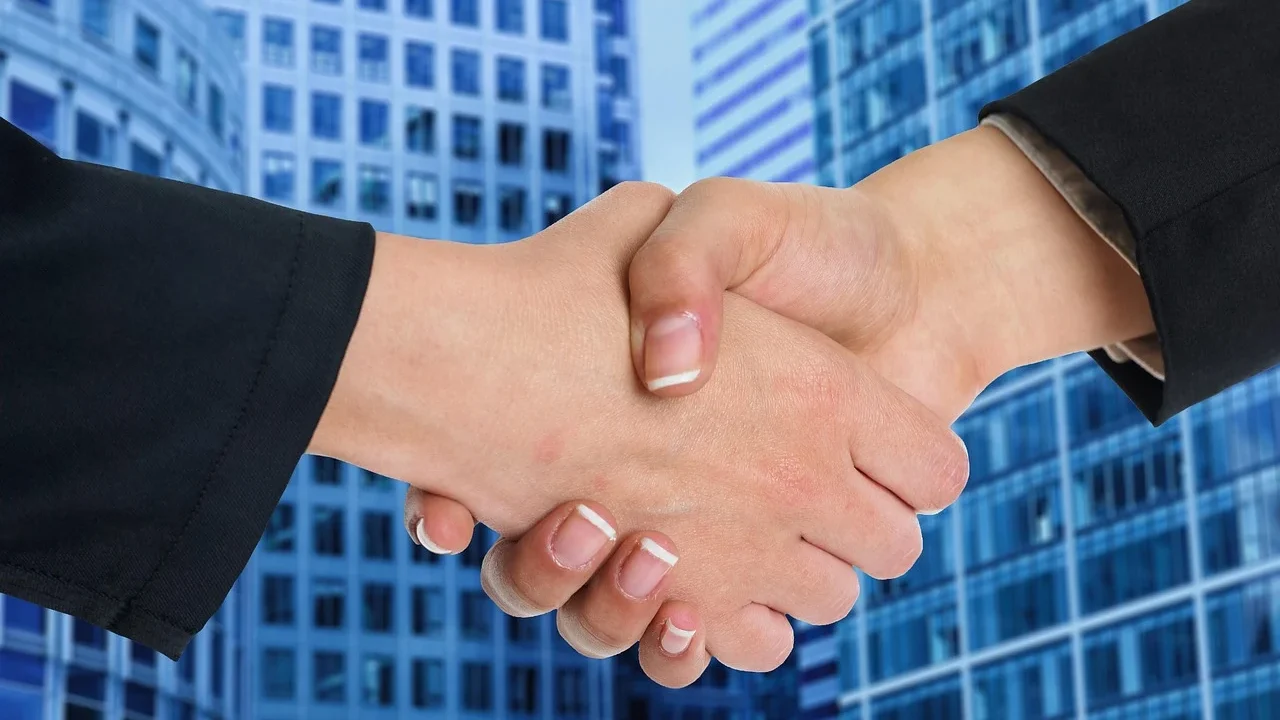 Business Partnership Handshake Success