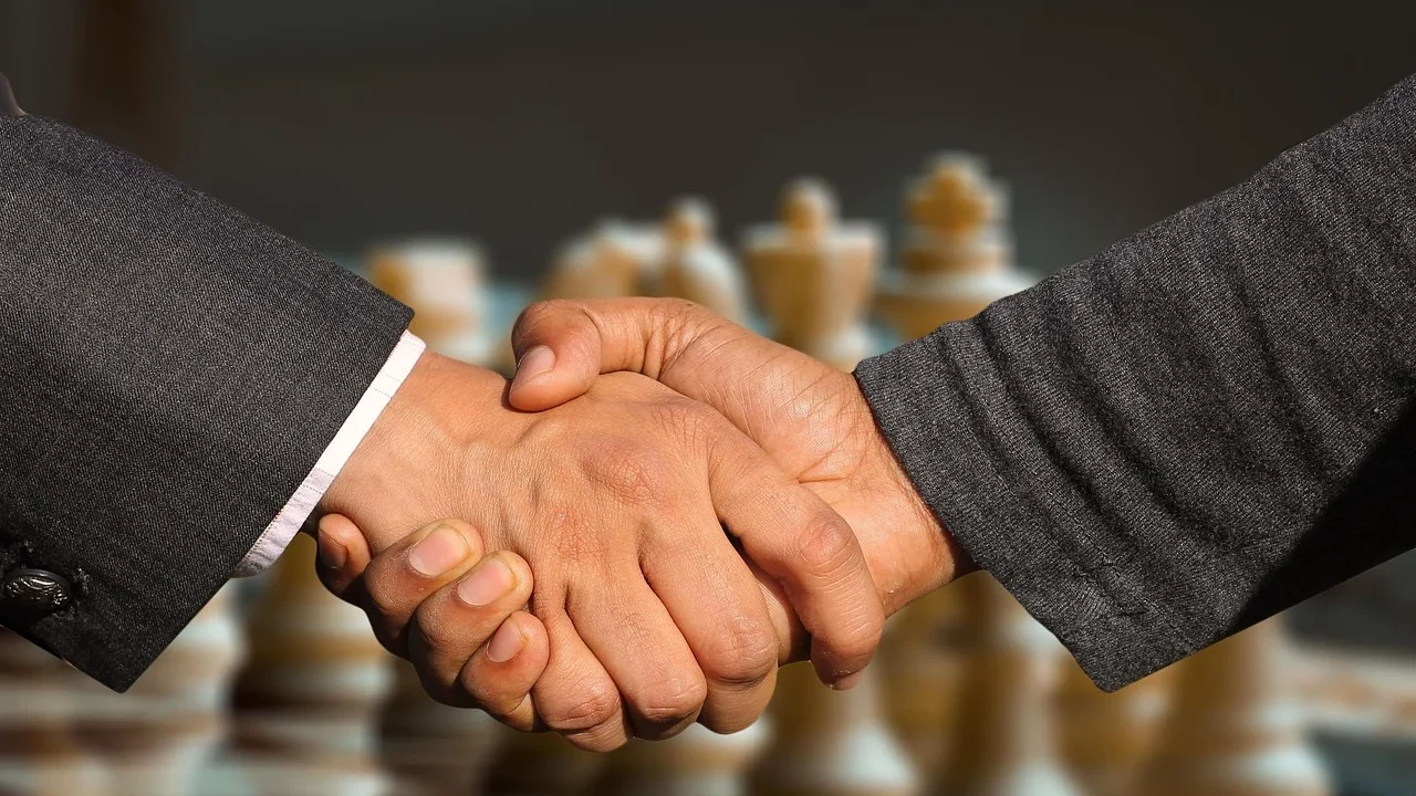 Teamwork Handshake Success