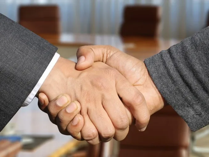Business Collaboration Networking Handshake